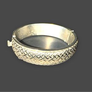 Vintage hinged bangle with security chain basket weave design